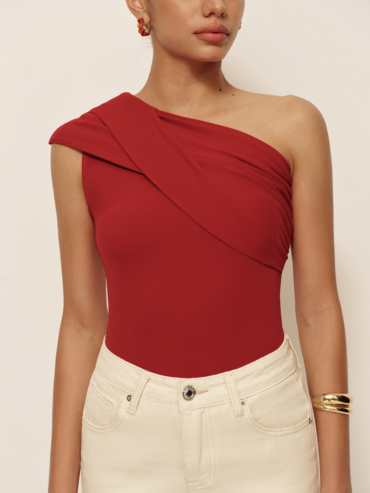 Asymmetrical Neck Sleeveless Jersey Top